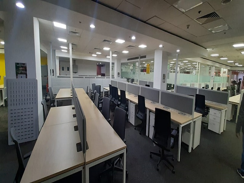 Image showcasing the completed assembly and installation of workstations and chairs for Ericsson by AIPL.